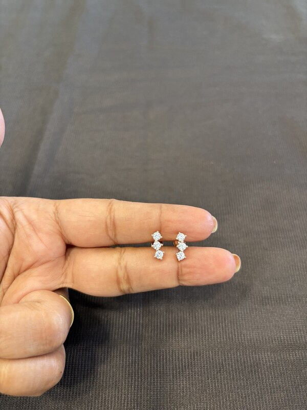 Silver three stone stud with rosegold finish