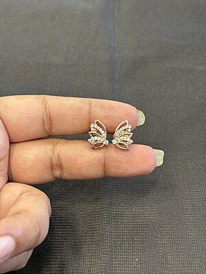 Silver wing stud with rose gold finish