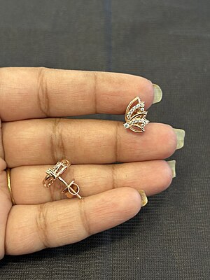 Silver wing stud with rose gold finish