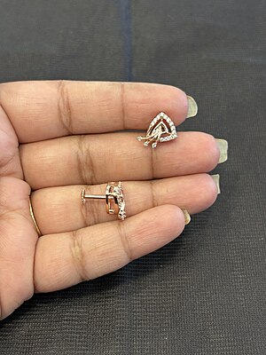 Silver triangle bloom stud with rose gold finish