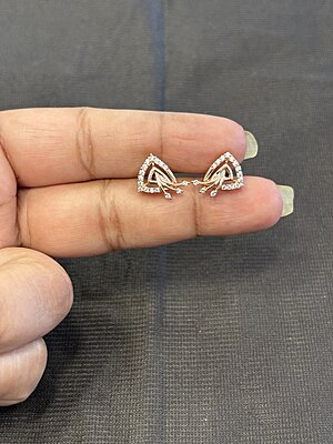 Silver triangle bloom stud with rose gold finish