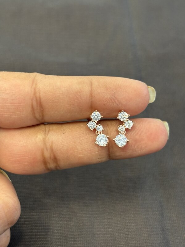 Silver three stone with hanging stud rose gold finish