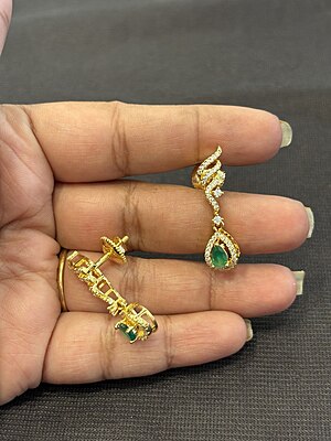 Silver varnam stud with gold finish