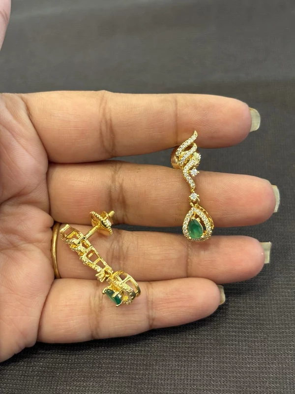 Silver varnam stud with gold finish
