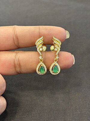 Silver varnam stud with gold finish