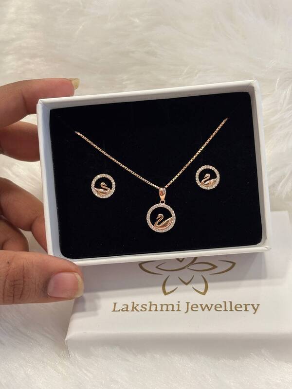 Silver round swan pedant set with rosegold finish