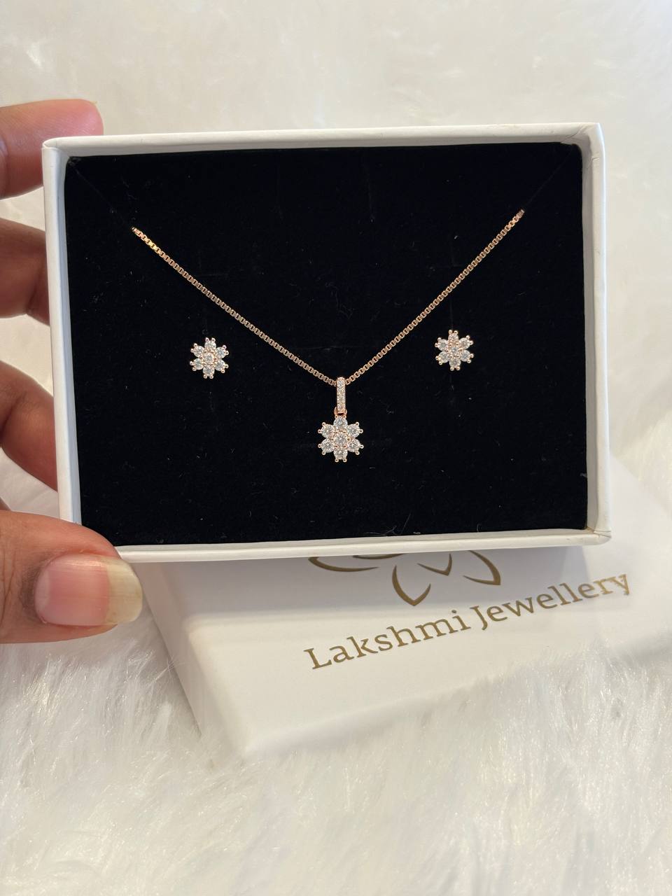 Silver seven stone pendant set with rosegold finish