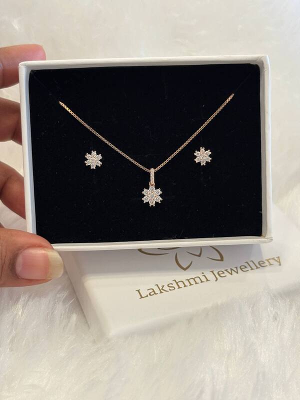 Silver seven stone pendant set with rosegold finish