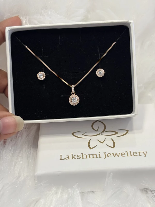 Silver vattam pendant set with rosegold finish