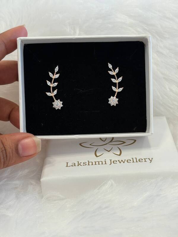 Silver stem flower bluetooth ear cuff with rosegold finish