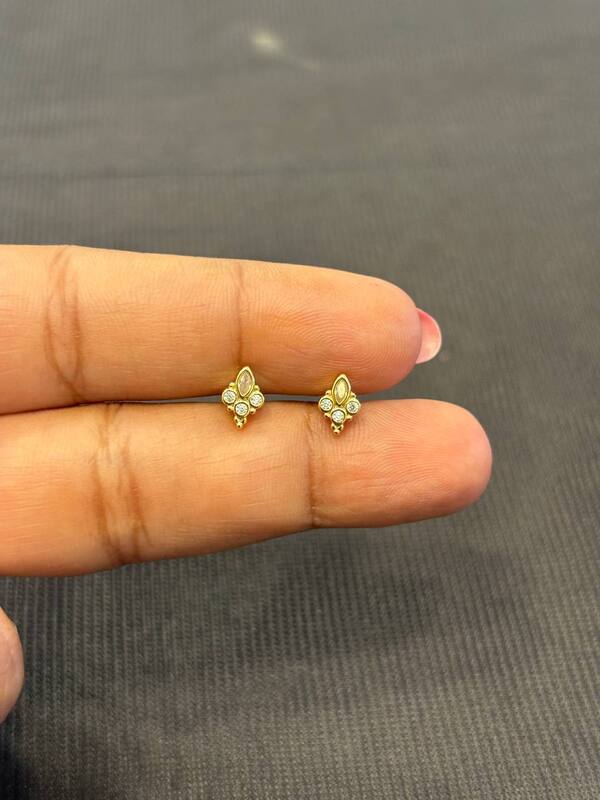 Silver temp second stud with gold finish