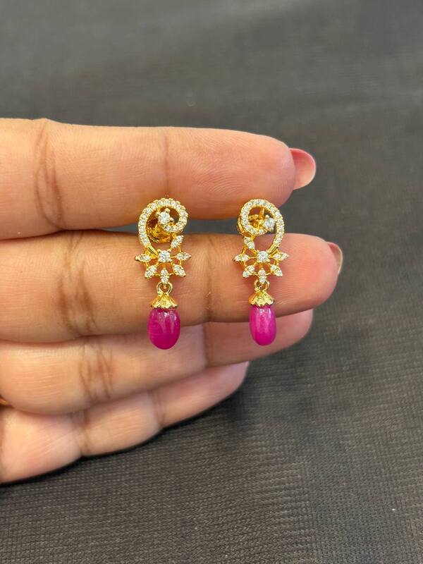 Silver pothigai stud with gold finish