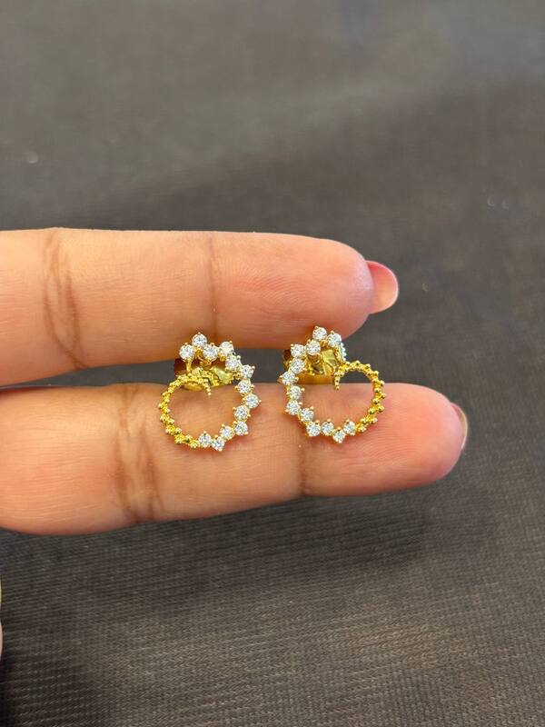 Silver round stud with gold finish