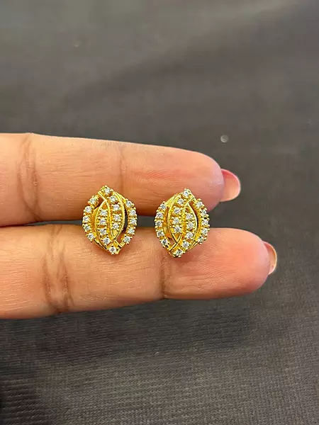 Silver nethra stud with gold finish