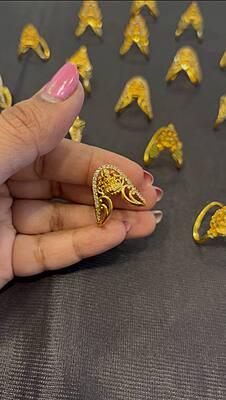 Silver vangi ring with lakshmi white stone with gold finish