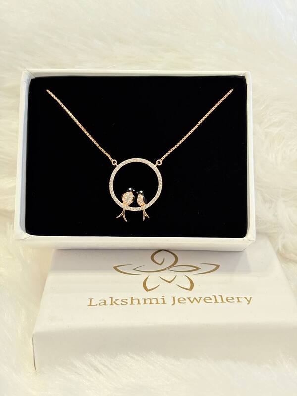 Silver twin kuyil pendant with rosegold finish