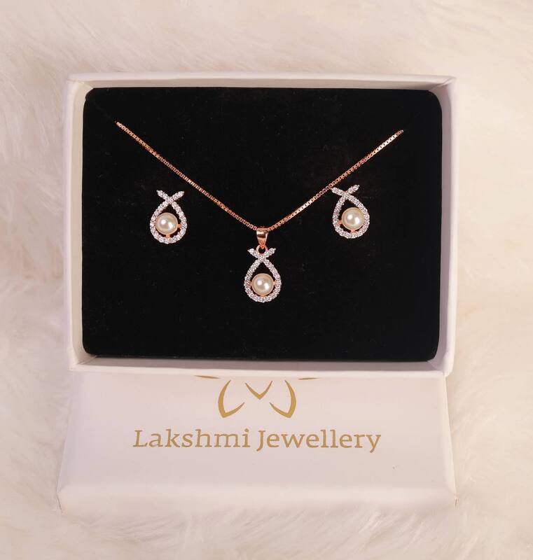 Silver muthu pedant set with rosegold finish