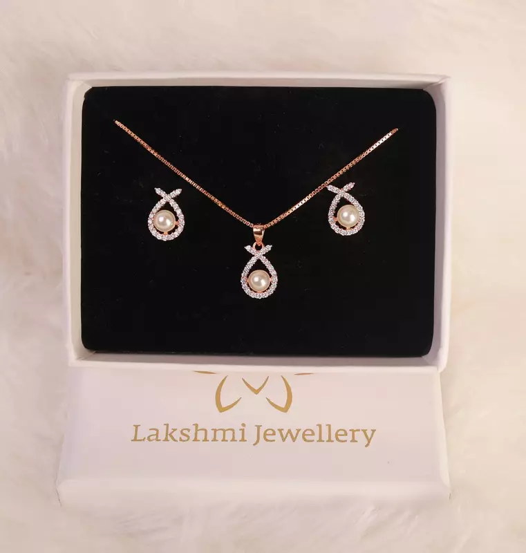 Silver muthu pedant set with rosegold finish