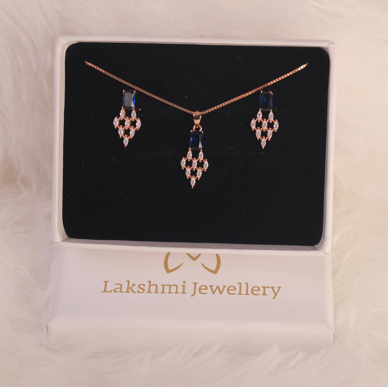 Silver malar blue pendant set with rosegold finish