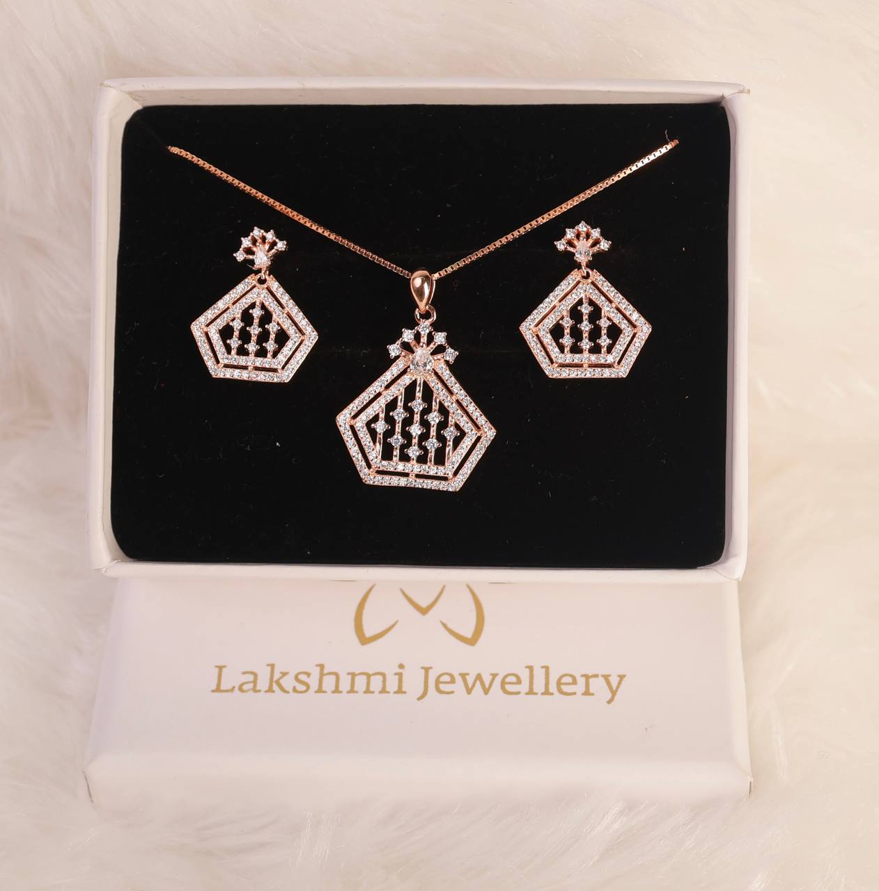 Silver then pendant set with rosegold finish