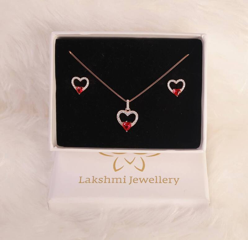 Silver innisai pedant set with rosegold finish