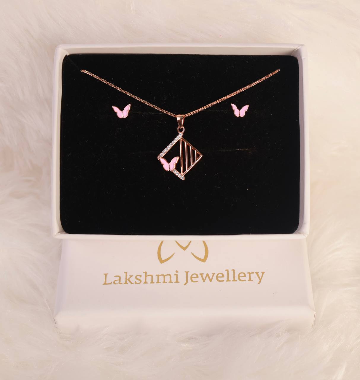 Silver pink tamizh butterfly pendant set with rosegodl finish