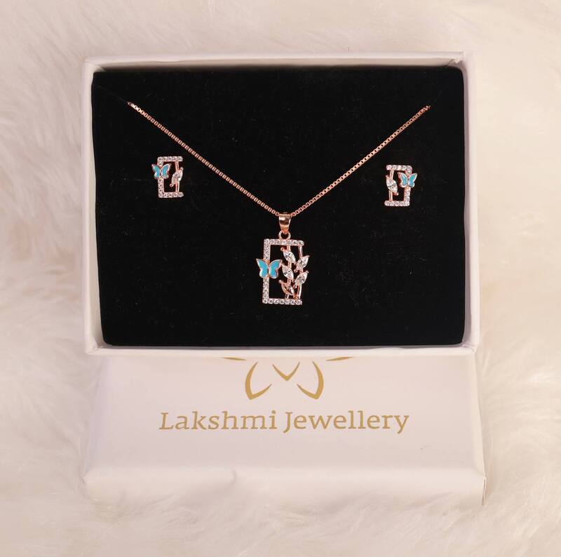 Silver flower butterfly pendant set with rosegold finish