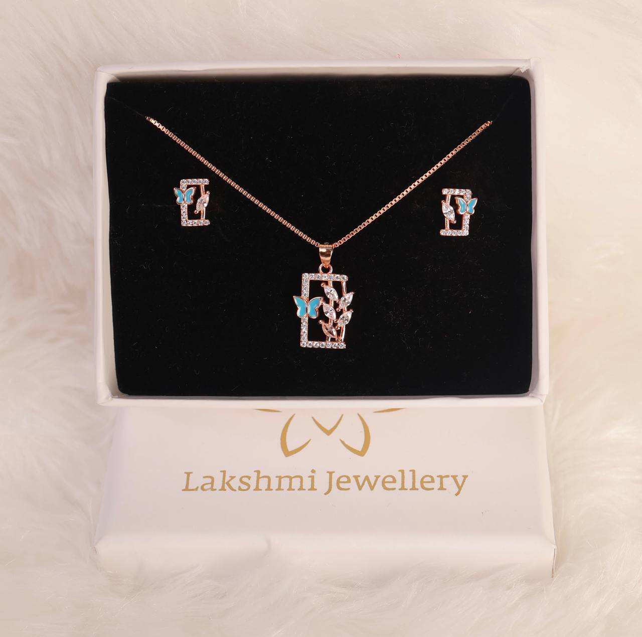 Silver flower butterfly pendant set with rosegold finish