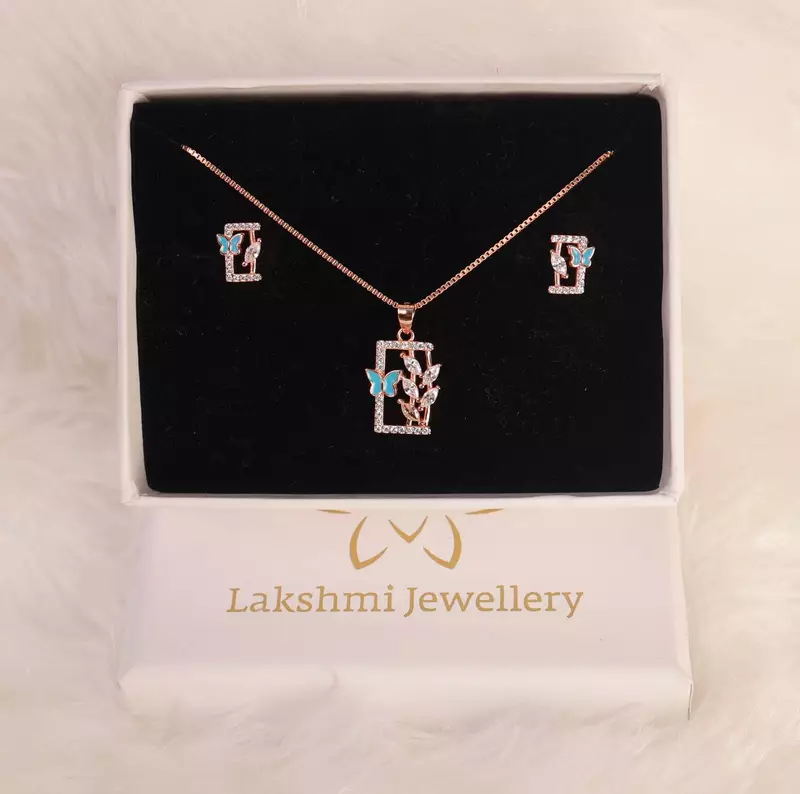 Silver flower butterfly pendant set with rosegold finish