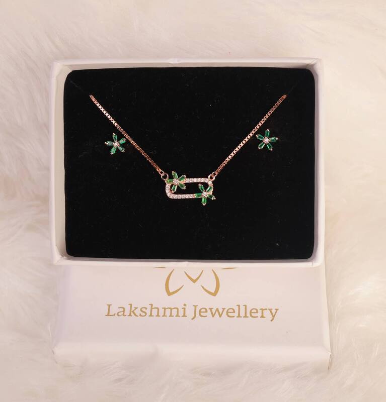 Silver raja pendant set with rosegold finish