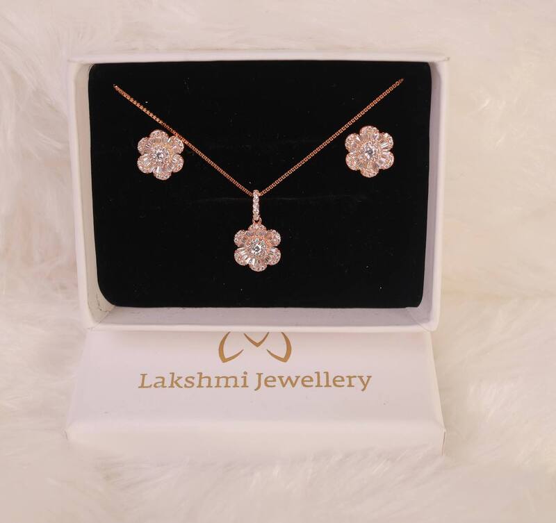 Silver malarvizhi pendant set with rosegold finish