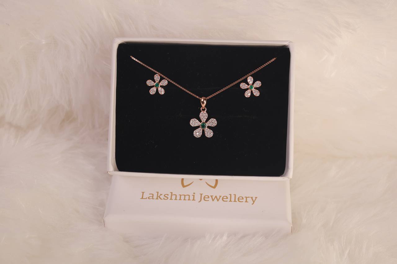 Silver flower green center stone with rosegold finish