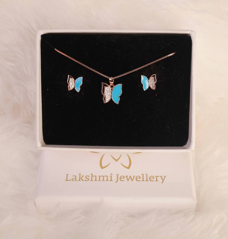 Silver blue half butterfly pendant set with rosegold finish