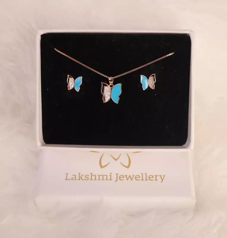 Silver blue half butterfly pendant set with rosegold finish