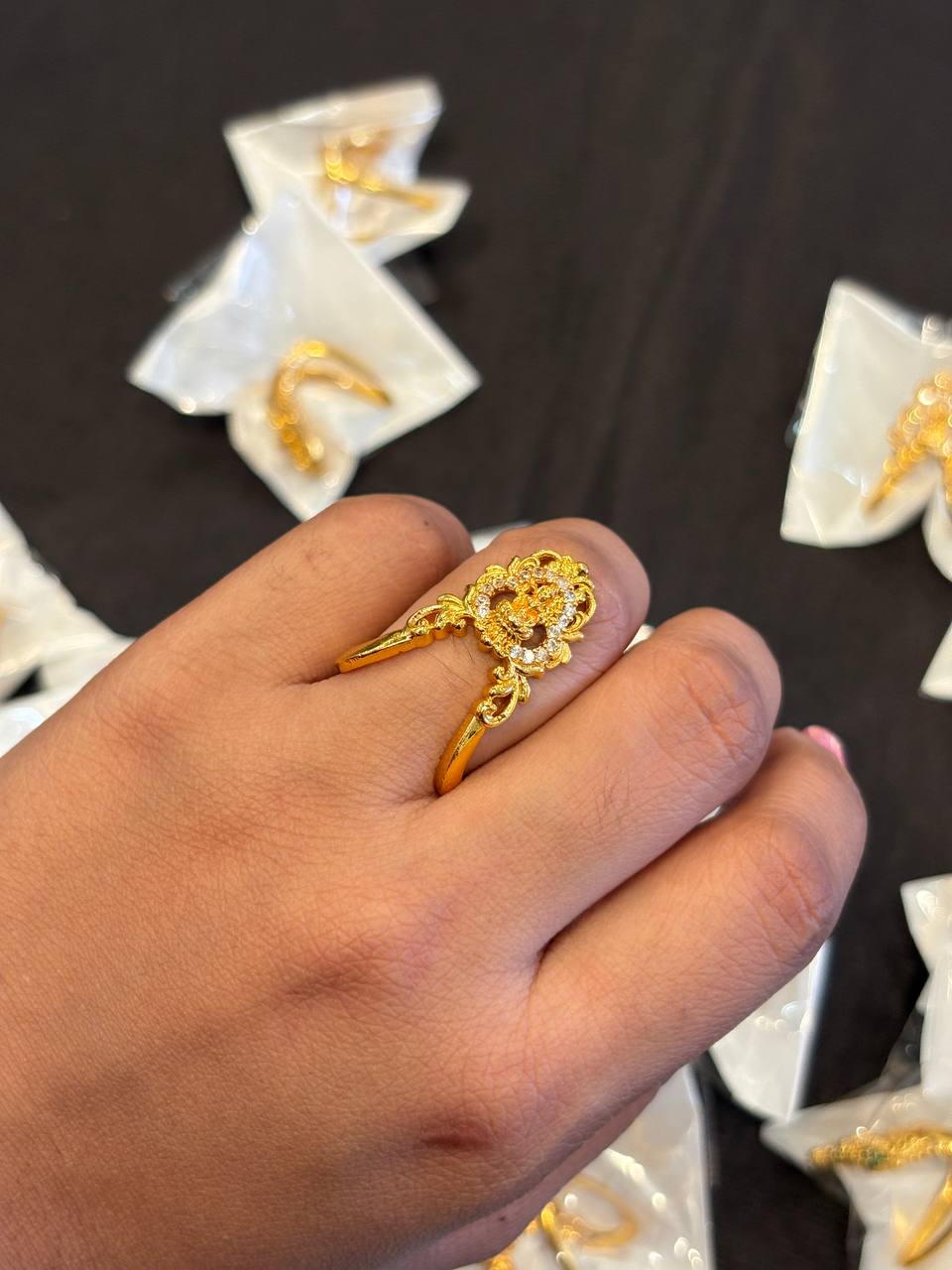 Silver white lakshmi vangi ring with gold finish