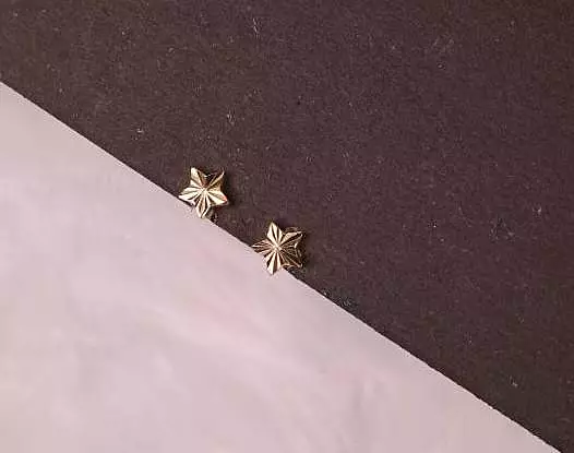 Silver new nakshthra second stud with gold finish