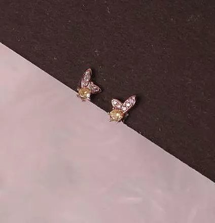 Silver bunny yellowsecond stud with rosegold finish