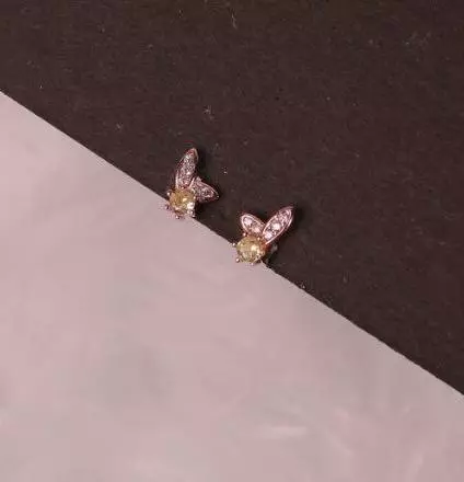 Silver bunny yellowsecond stud with rosegold finish