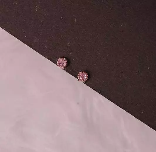 Silver nivetha second stud with rosegold finish