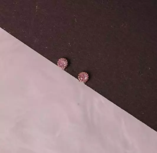 Silver nivetha second stud with rosegold finish