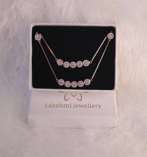 Siver five stobe anklet with rosegold finish