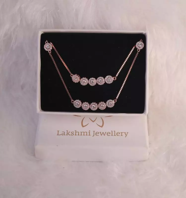 Siver five stobe anklet with rosegold finish