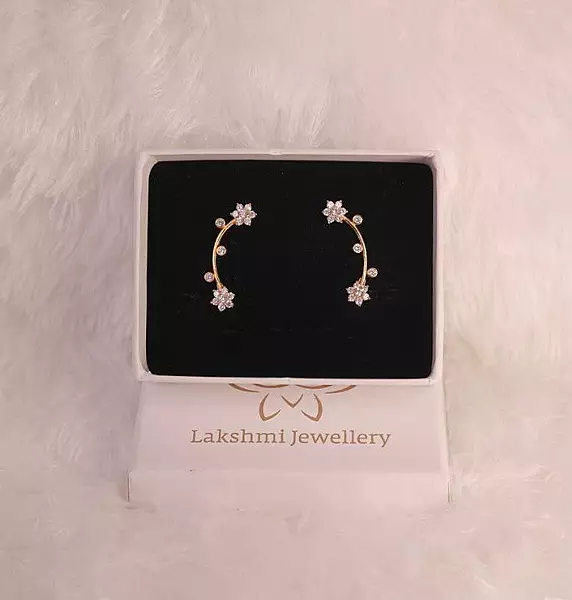 Silver double flower ear cuff with gold finish