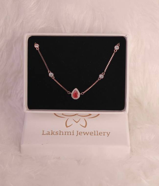 Silver red drop bracelet with rosegold finish