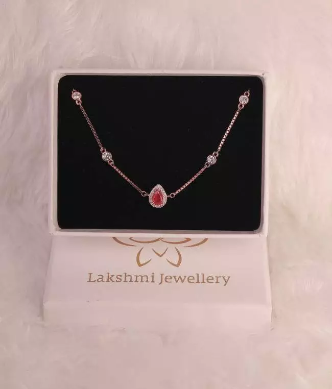 Silver red drop bracelet with rosegold finish