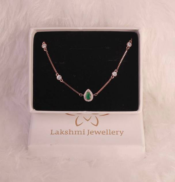 Silver drop green bracelet with rosegold finish