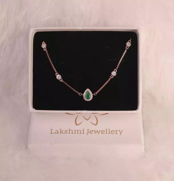 Silver drop green bracelet with rosegold finish