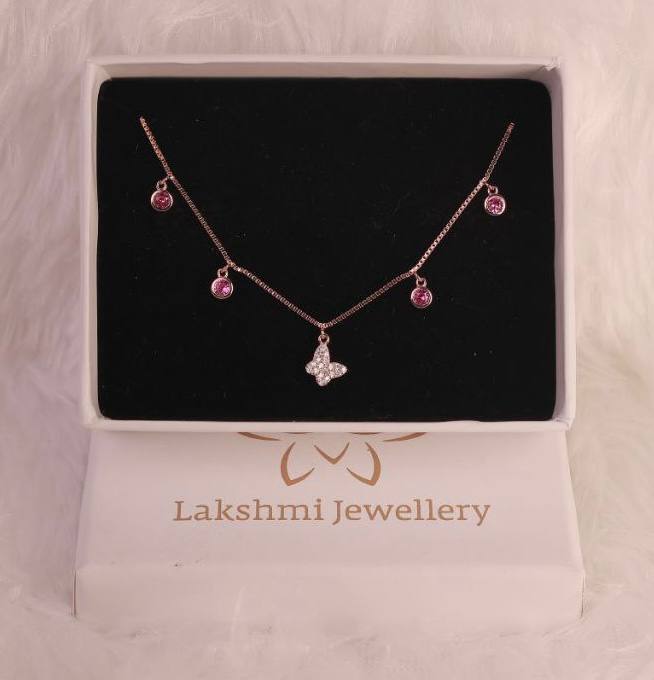 Silver butterfly charms bracelet with rosegold finish