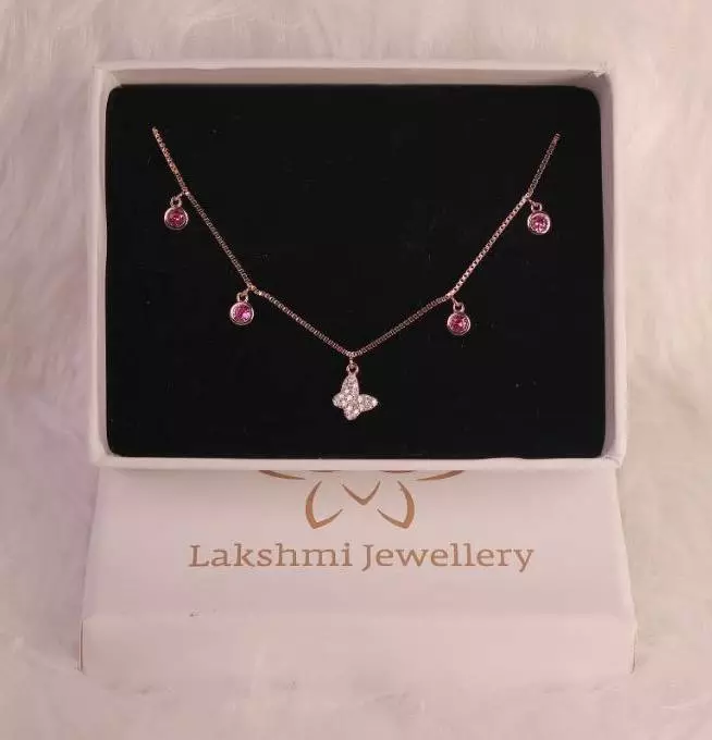 Silver butterfly charms bracelet with rosegold finish