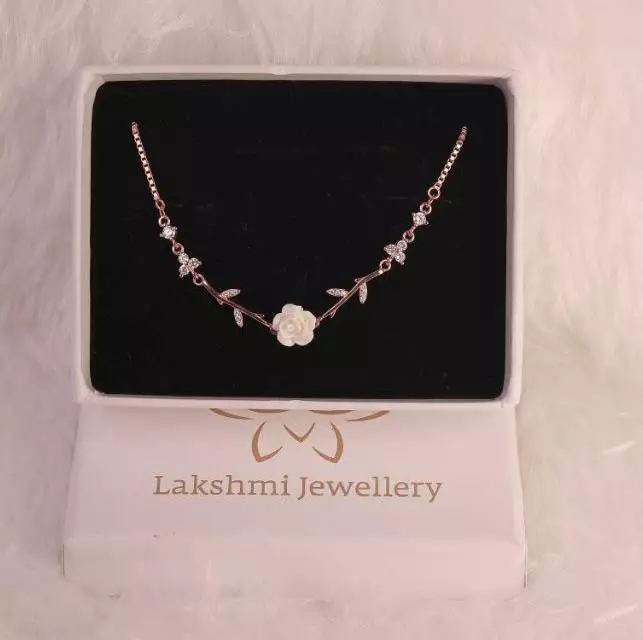 Silver flower1 bracelet with rosegold finish
